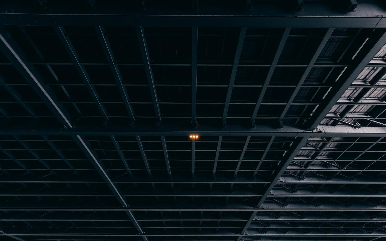 Dense structural grid in raking light