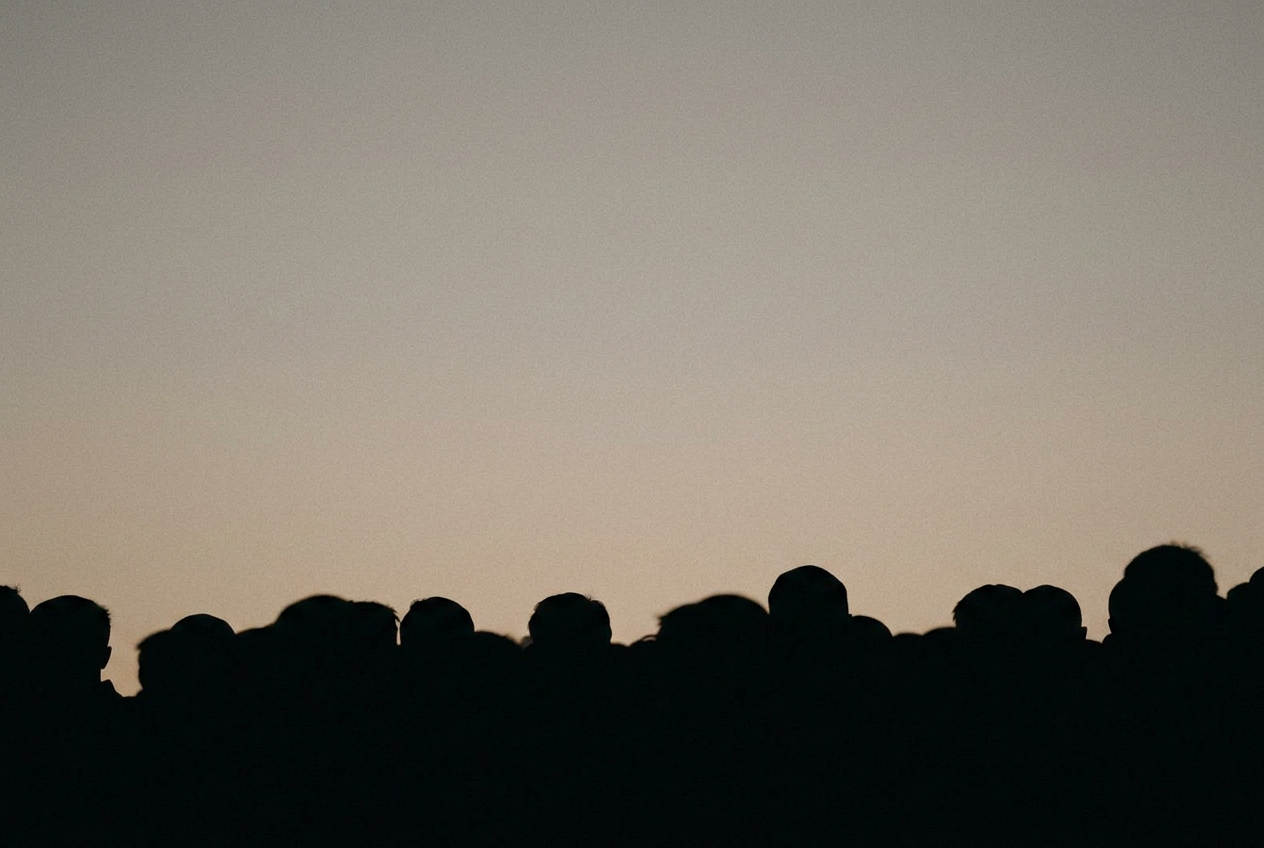 Overlapping silhouettes forming one mass